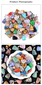 Close-up of geometric trapezoid crystal pendants with silver metal clasps for DIY jewelry