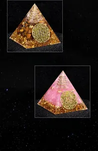 Detail of Orgone pyramid with white crystal, tiger eye, and flower of life metal symbol