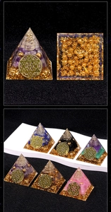Detail of Orgonite pyramid with layered healing stones and Flower of Life symbol