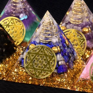 Orgonite energy pyramids with lapis lazuli, copper coils and flower of life symbols
