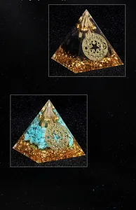 Detail view of Orgone pyramid with obsidian, turquoise, gold foil and copper coil