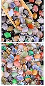 Detailed view of various natural gemstone fan-shaped pendants with silver metal clasps