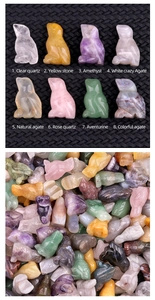 Detailed view of varied natural semi-precious gemstone bird carvings in eight mineral types