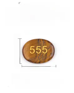 Tiger eye palm stone size guide showing 45mm width and 35mm height with engraved 555