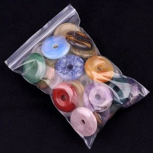 Assortiment de pendentifs en agate et cristal naturel en forme de beignet rond en vrac