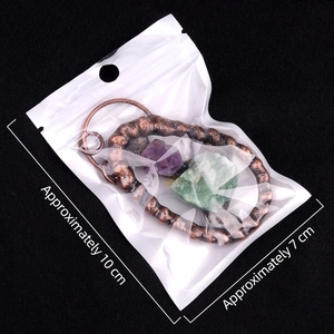 Pendentif en pierre de cristal naturel avec enveloppe en bronze vintage emballé