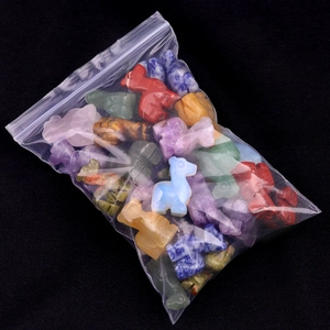 Mini gemstone deer figurines carved from amethyst and tiger eye in multiple colors