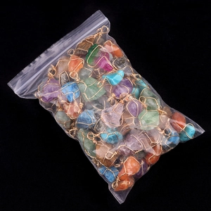 Assorted natural gemstone wire wrapped pendants with amethyst and rose quartz in a pouch