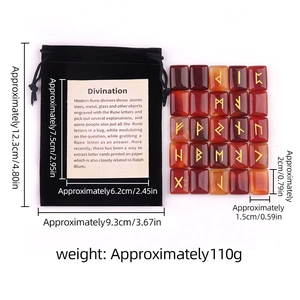 Polished red agate runes stone set with gold engraving and black velvet pouch