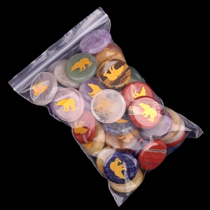 Polished crystal agate bear carvings set in various gemstones with golden patterns