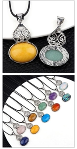 Macro detail of oval gourd pendants in natural crystal and colorful gemstone textures