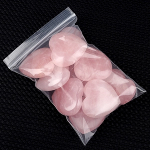 Polished natural rose quartz heart-shaped stones for home decor and healing