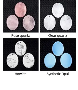 Detailed macro view of four oval gemstone pendants with precision drilled holes