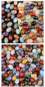 Detailed view of assorted oval gemstone beads including amethyst and tiger eye for DIY jewelry