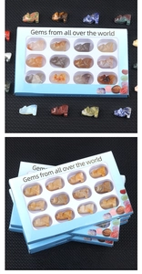 Set of 12 carved gemstone wolf figurines in various natural stones with a display gift box