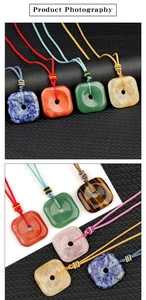 Detailed macro view of assorted natural crystal square pendants with colorful braided cords