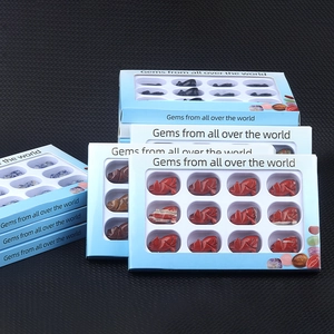 Set of 12 hand-carved natural gemstone wolf figurines in a gift box with various stones
