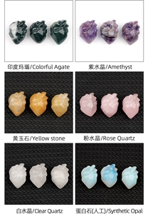 Detailed view of assorted heart-shaped carved crystals like amethyst and quartz