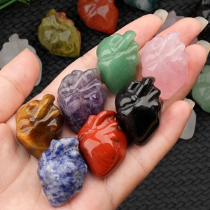 Handheld anatomical heart carvings in assorted natural gemstones for crystal healing