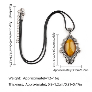 Pendentif vintage en œil de tigre ovale avec cadre floral argenté et collier cordon noir