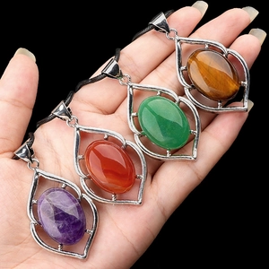 Natural crystal teardrop pendants with amethyst and tiger eye on black cords