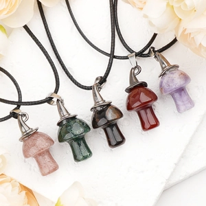 Natural crystal mushroom pendant necklaces in rose quartz and amethyst with black cords