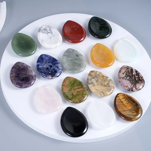 Set of 15 teardrop-shaped natural crystal worry stones for healing and palm therapy