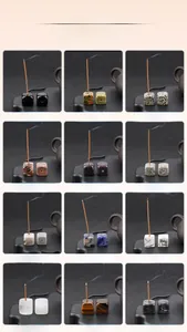 Zen style cube incense burner made of natural crystals and stones on a tea table