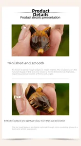 Macro detail of hand-carved tiger eye stone fox head showing golden sheen and texture