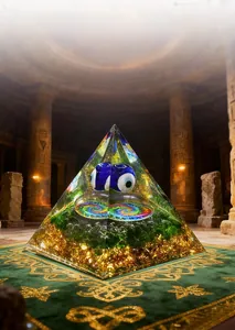 Detailed 6cm resin pyramid featuring evil eye bead and gold foil in temple setting