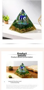Detailed macro view of the Orgone pyramid with blue evil eye and gold leaf accents