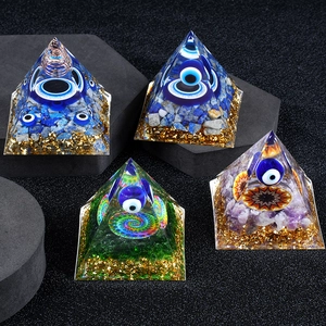 Orgonite Pyramid with Evil Eye bead, copper coil and natural healing crystals