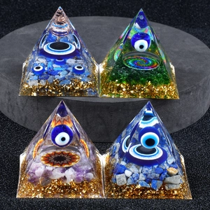 Orgonite energy pyramid set with Evil Eye and crushed healing stones in resin