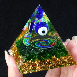 6cm Blue Evil Eye Orgonite Pyramid with Peridot crystals and gold foil for home decor