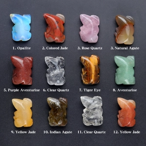 Assorted natural crystal and agate mini rabbit figurines carved from semi-precious stones