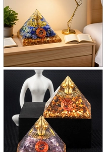 Detailed view of handmade crystal oragonite pyramid with healing stones and copper coil