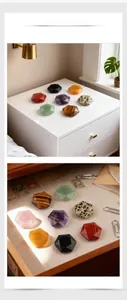 Detailed view of assorted hexagonal crystal stones on white furniture and a vintage drawer