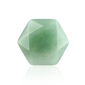 Faceted natural green crystal star stone with geometric cutting on white background