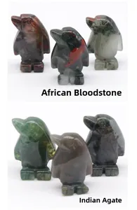Hand-carved African Bloodstone and Indian Agate penguin figurines with natural textures