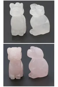 Detailed view of hand-carved clear quartz and rose quartz crystal bulldog figurines