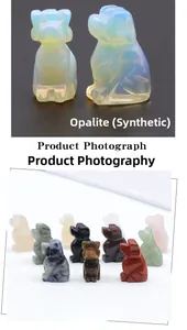 Detailed view of hand-carved dog figurines made from opalite and assorted gemstones
