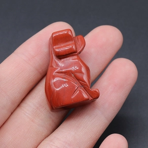 Mini hand-carved red jasper dog figurine made of natural gemstone for desk decor