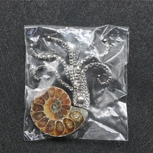 Vintage Silberne Oktopus Brosche mit Nautilus Fossil Einlage im Ozean Steampunk Design