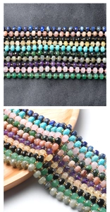 Macro detail of faceted gemstone wheel beads in lapis, rose quartz and amethyst for DIY jewelry