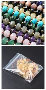 Macro shot of faceted gemstone beads including amethyst and quartz in clear packaging