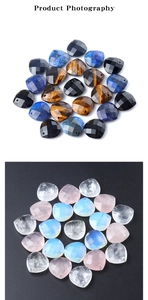Macro shot of faceted heart-shaped crystal charms with pre-drilled holes for DIY jewelry