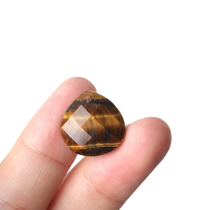 Faceted tiger eye heart crystal pendant with natural brown and gold chatoyancy effect