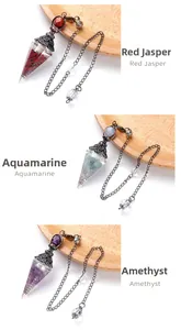 Detail of red jasper, aquamarine and amethyst resin crystal pendulum pendants
