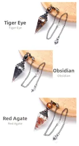 Detailed view of hexagonal resin cone pendants with tiger eye, obsidian and red agate stones
