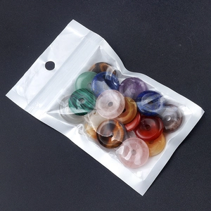 Polished colorful gemstone donut pendant beads including tiger eye and rose quartz stones